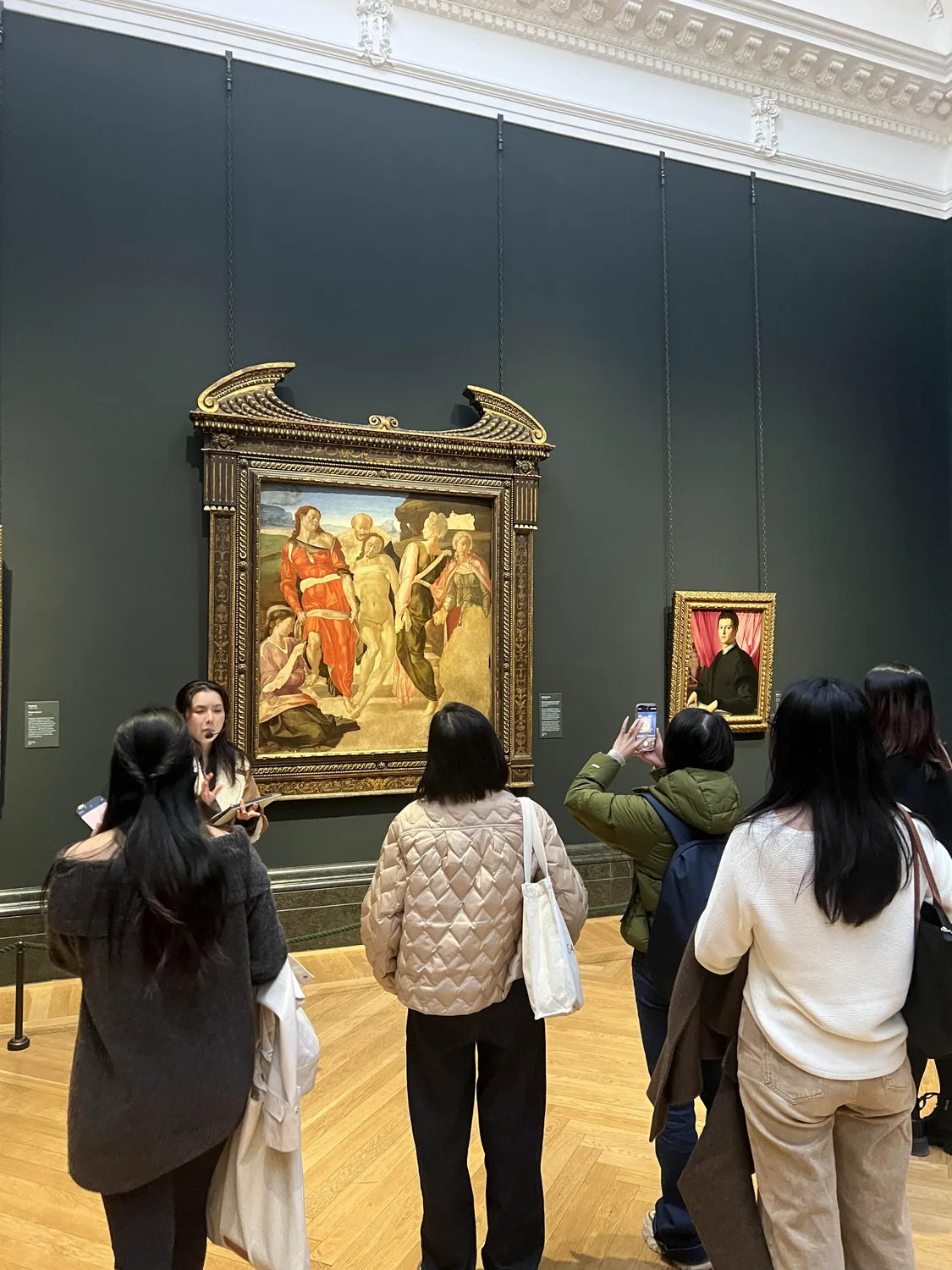 Sterna Language participants listening to a guide during a gallery visit